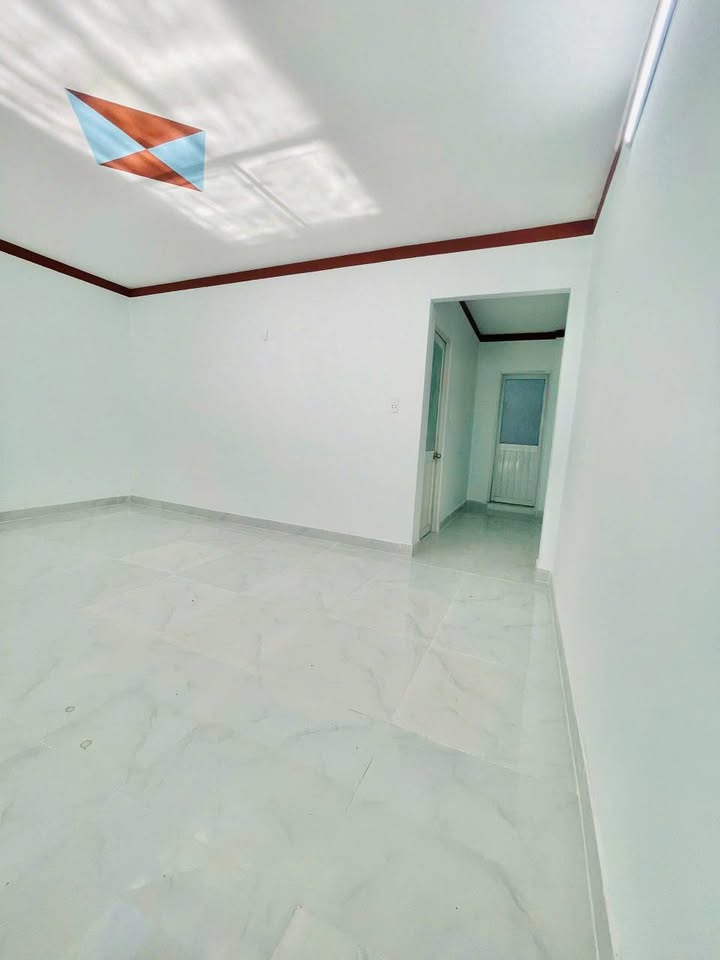 Bán nhà 2PN, sổ hồng riêng – mặt tiền đường nhựa Tân Phước Khánh 52 – 80,5m² – 2,45 tỷ