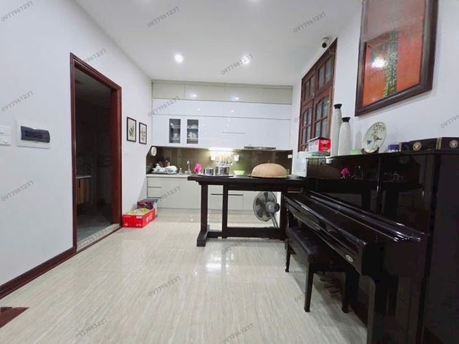 BÁN NHÀ MẶT PHỐ ĐẶNG THÙY TRÂM 74m2 - HAI THOÁNG + Ô CHỜ THANG MÁY - K.DOANH - V.PHÒNG
