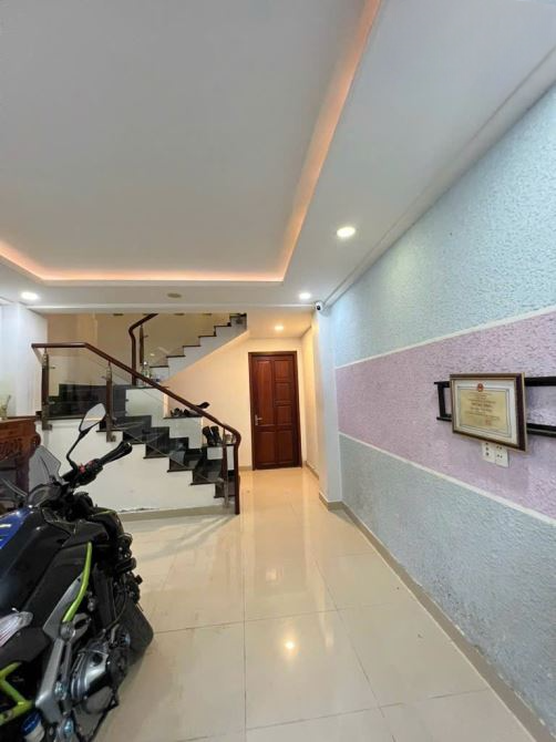 BÌNH THẠNH - MẶT TIỀN THỤT CHỢ BÀ CHIỂU - DT (4Mx8M) 4 TẦNG BTCT - VỊ TRÍ ĐẮC ĐỊA - 5