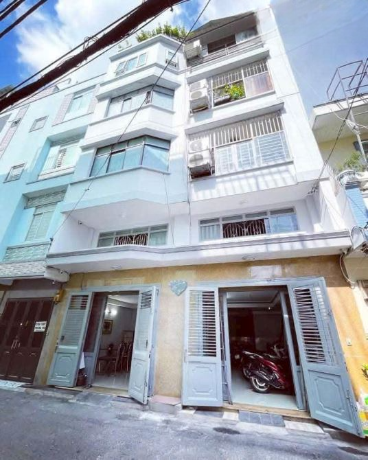 MẶT TIỀN ĐƯỜNG SỐ Q.4 DTSD 280m2 XE HƠI TRONG NHÀ NHỈNH 15TỶ
