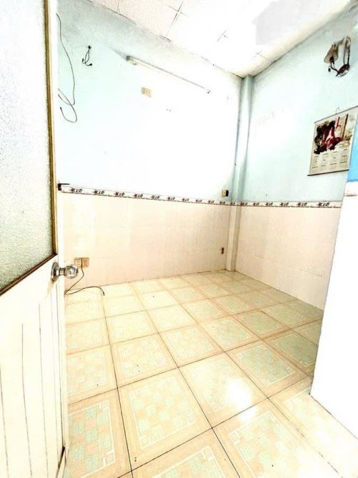 Nhà bán: đường Tôn Đản, DTSD 26m2, 3 tầng, giá 2,6 tỷ